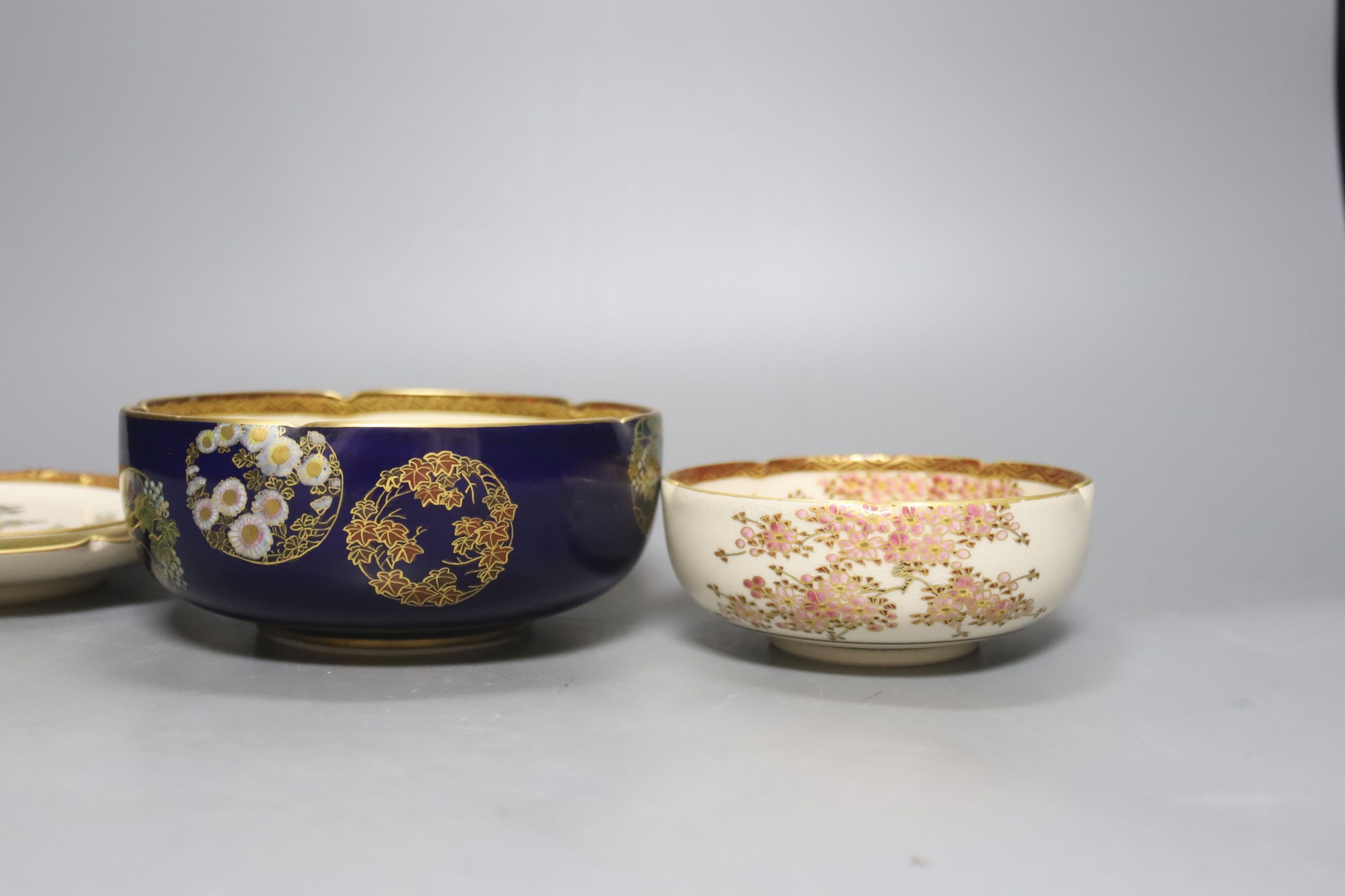A collection of Japanese Satsuma, vases, bowls and lidded jars, 9 items in total, tallest item,18 cms high.